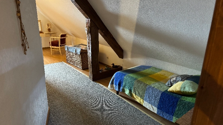 Camera al piano superiore con letto singolo